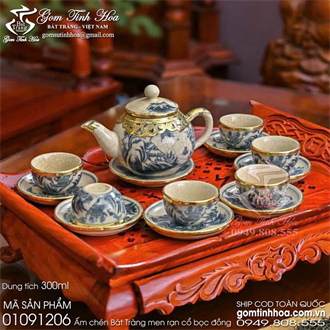 Ấm chén quả hồng men rạn cổ bọc đồng vẽ sơn thủy